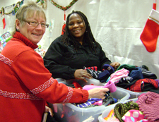 Volunteer assisting shopper