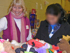 Volunteer helping shopper